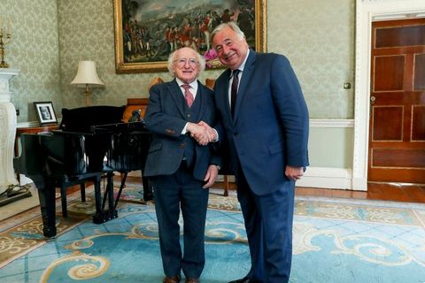 President Michael D. Higgins greets Gérard Larcher, president of the Senate of France, at Aras an Uachtarain